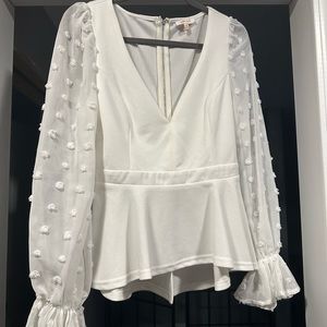 A Peach white shirt, size medium. Beautiful, adorable sleeves. Worn once